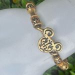 ALEX AND ANI Disney gold tone filigree wrap bracelet Photo 12