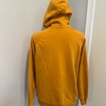 The North Face  Women’s Sz: M Hoodie Sweatshirt Mustard Yellow Logo Pullover. Photo 1