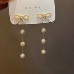 Elegant Bow White Pearl Dangle Drop Earrings for Women Gold Photo 0