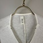 Jolie White Zipper Relaxed Fit Top Photo 3