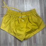 FP Movement Gold Women's Athletic Shorts. Size Small Yellow Photo 3