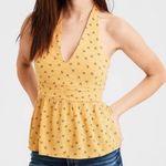 American Eagle Yellow Floral Halter Smocked Peplum Sleeveless Top Size XL Photo 0
