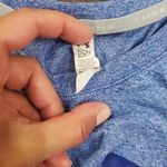 Under Armour Under armor dri fit tshirt size xs women's but fits larger more like small Photo 1