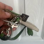 Coach Brown and Green Floral Daisy Coin Charm Photo 5