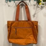 Nine West Y2K orange starburst tote purse half moon pocket Photo 3