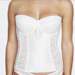 Dominique Colette Lace Corset Elegant lace trim adds a romantic touch to this full-length Photo 1