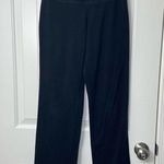 Athletic Works EUC women’s solid black flare leg high waist tech pocket leggings Photo 0