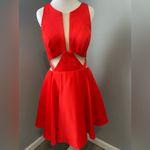 Sherri Hill short red dress with cutouts and a sheer neckline Photo 2