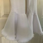Vibrant White Flare Jeans Photo 2