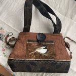 Artisan Quilted  embroidered Chic-a-dee double handle satchel. Photo 0