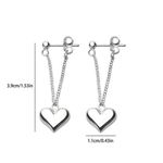 Silver heart dangling earrings! New Silver Photo 2