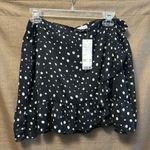 Urban Outfitters NWT  Women Black Ruffle Hem Polka Dot Wrap Mini Skirt Size Large Photo 1