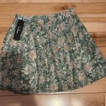 Lulus LULU’S COUNT THE PETALS GREEN FLORAL PRINT PLEATED MINI SKIRT Photo 5