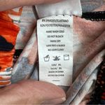 Agnes & Dora  Orange and Blue Patterned Leggings Photo 3