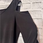 Kirkland Signature Elegant Black Floral Hem top with cold‎ shoulder embroidered flower shape cutout Photo 2