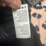 BNCI by Blanc Noir Blanc Noir Black Breakthrough Puffer Vest with Reflective Trim & Hood Size Small. Photo 9