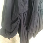 Hemline Black strapless dress with draped . Photo 12