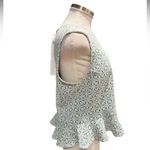 Sunday in Brooklyn  Peplum top with a geometric pattern  
Fits like a Small NWT Photo 2