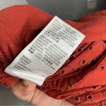 Free People rust colored eyelet jumpsuit zip up size 4β Photo 10