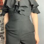 Francesca's Black Ruffle Cold Shoulder Romper Photo 1