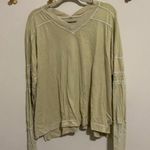 Free People  Movement Pale Yellow Pullover size Medium Photo 1