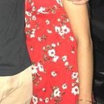 Francesca's Red Floral Romper Photo 0