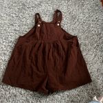 Brown overall romper size large Photo 1
