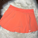 Nike  coral tennis/golf skort sz large Photo 0