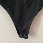 Abercrombie & Fitch Women's size Small Black Cut-Out Long Sleeve Bodysuit Top Photo 4