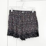 Anthropologie  Kimchi Blue Medium Black Floral Lace Shorts with Pockets Photo 0