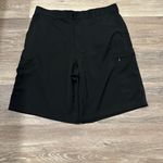 IZOD Mens straight golf shorts are a size 36. Photo 4