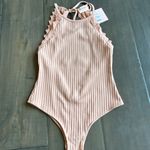 Showpo Staring Back At You Bodysuit in Blush Photo 0