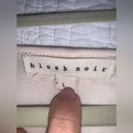 Blush Noir : Asymmetrical Hem Creme Tunic with Delicate Lace details. Photo 6