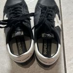 Golden Goose  Black and White Star Sneakers Photo 4