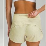 Lululemon Speed Up Mid-Rise Short 4"
Gravel Dust Dew Green Multi / Dew Green 2 Photo 2