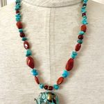 Brass elephant pendant necklace with carnelian, turquoise and red jasper beads Photo 0