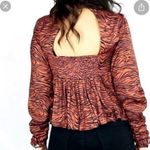 Free People Silent Rawr Brown Tiger Striped Open Back Peplum Top, size M Photo 4