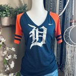 Women’s Nike Detroit Tigers Striped Sleeve Metallic Logo Baseball Tee Orange Photo 0
