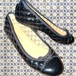 Christopher & Banks  black patten leather quilted look design with tie on front Photo 2