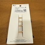 American Eagle NWT Outfitters 4 back bowtie heart charms Photo 1