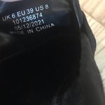 ASOS  DESIGN Storm chunky mid heeled loafers in black suedette Photo 7