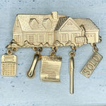 303. JJ Goldtone Real Estate Themed Brooch Gold Photo 0