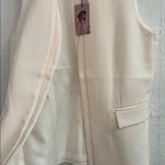 Ivory Sleeveless Vest by Sincerely Jules Photo 4