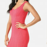 Bebe  textured Bodycon dress in Coral sz P/S Photo 0
