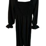 Black Ruffled Sleeve Jumpsuit Photo 0