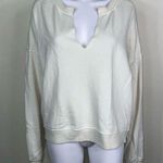 Forever 21 + Torn Collar Sweatshirt in Off White Photo 0
