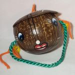 Coconut souvenir purse with painted face pearly bead nose & yarn handle Green Photo 0