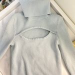 Sweet & Sinful  Light Blue Turtleneck Cutout Sweater Photo 0