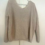 Impressions | Light cream/beige sweater with tied back Photo 0