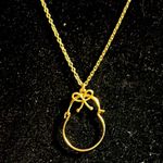 Elegant Gold Bow Charm Holder Pendant Necklace Photo 0